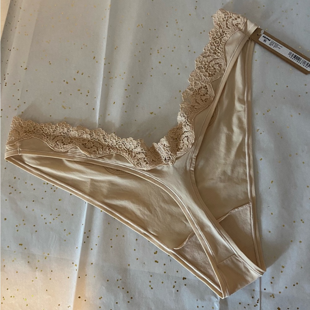 SKIMS Lace Dipped Thong Panty